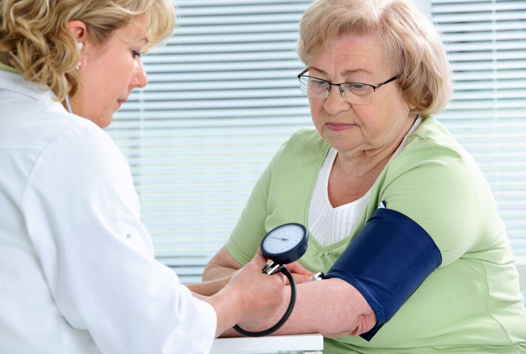 a woman's blood pressure is measured